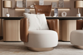 Visitor Chair hero shot — white bouclé and cognac leather accent chair