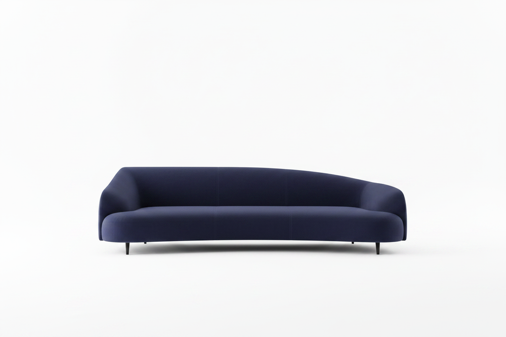 Navy blue curved sofa clean product shot