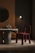 Atmospheric interior shot of the Bold Tubular Velvet Chair