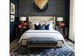 Blue ikat bench at foot of bed in luxury bedroom