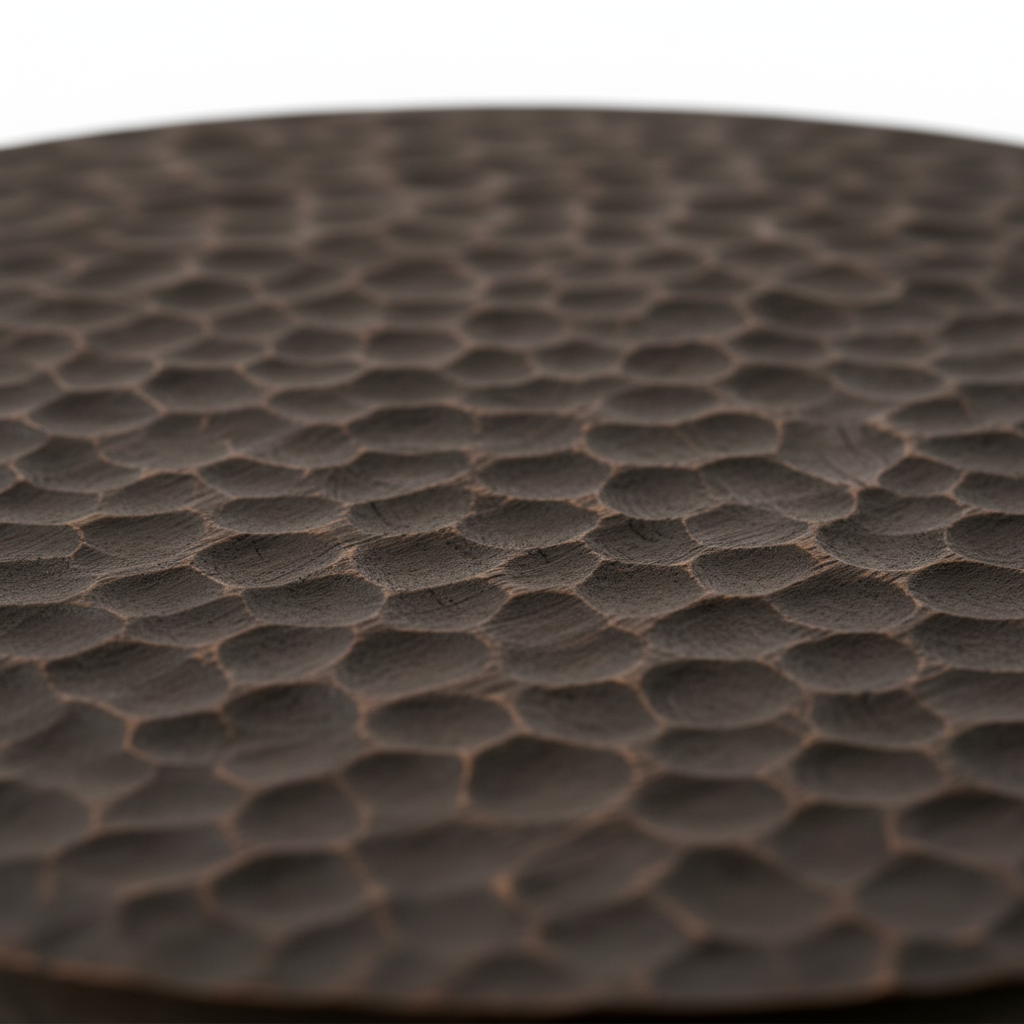Close-up of the hand-carved texture on the Carved Bowl Coffee Table